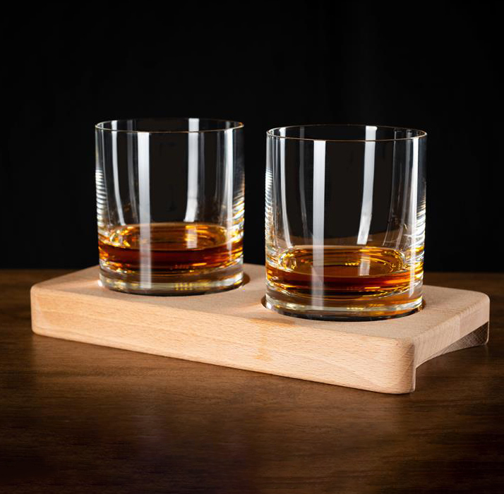 whiskey glasses in wooden holder